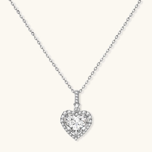 Sterling silver heart pendant necklace with brilliant moissanite center stone and halo setting on delicate chain